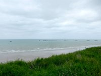 Remnants of WW2 Arromanches temporary artificial harbor  Temporary breakwaters installed on D-Day