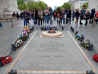 Memorial flame and tomb of the unknown soldier at Arc de Triomphe