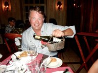 Craig pouring wine at Cafe Pushkin : Craig Stenson