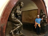 Ploshchad Revolyutsii metro station, Moscow  Craig is rubbing the dog's nose for good luck : Craig Stenson