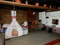 House on Kizhi island  Fireplace for cooking and heat on the right and bed for pregnant and new mothers. High shelves for safe keeping.